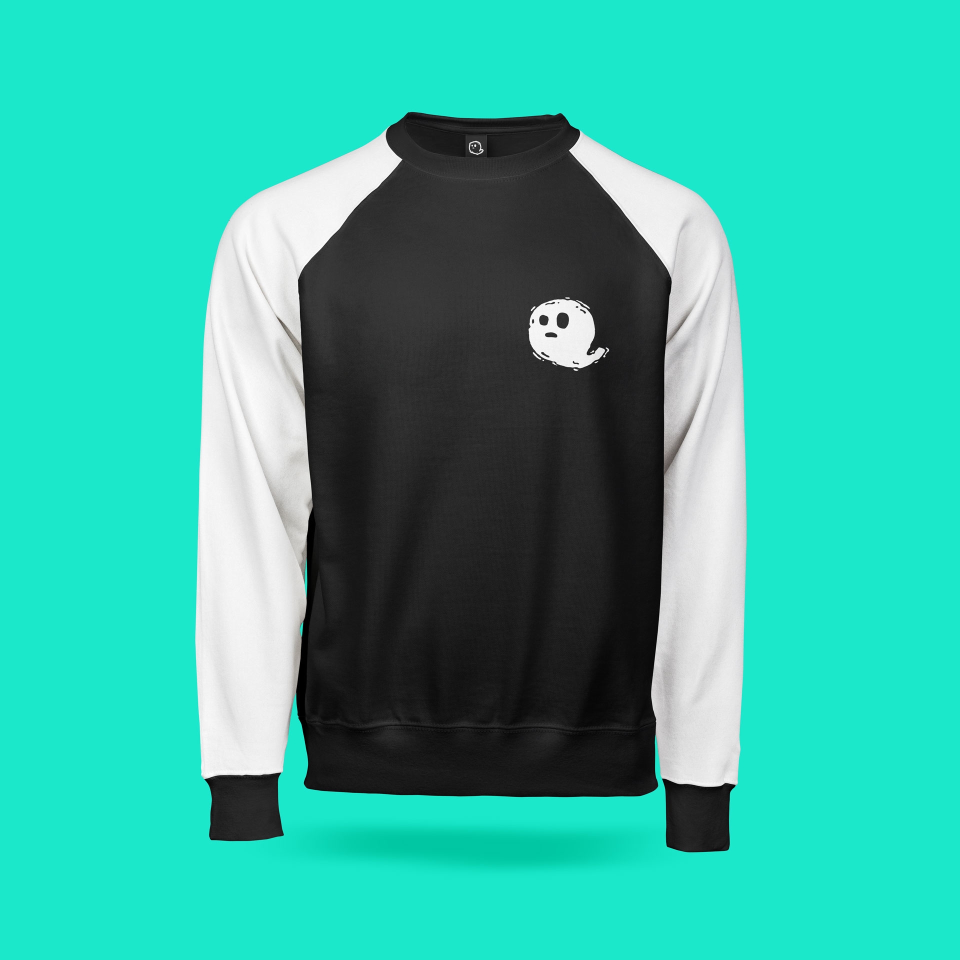 The new Amateur Ghost logo on a black and white jumper