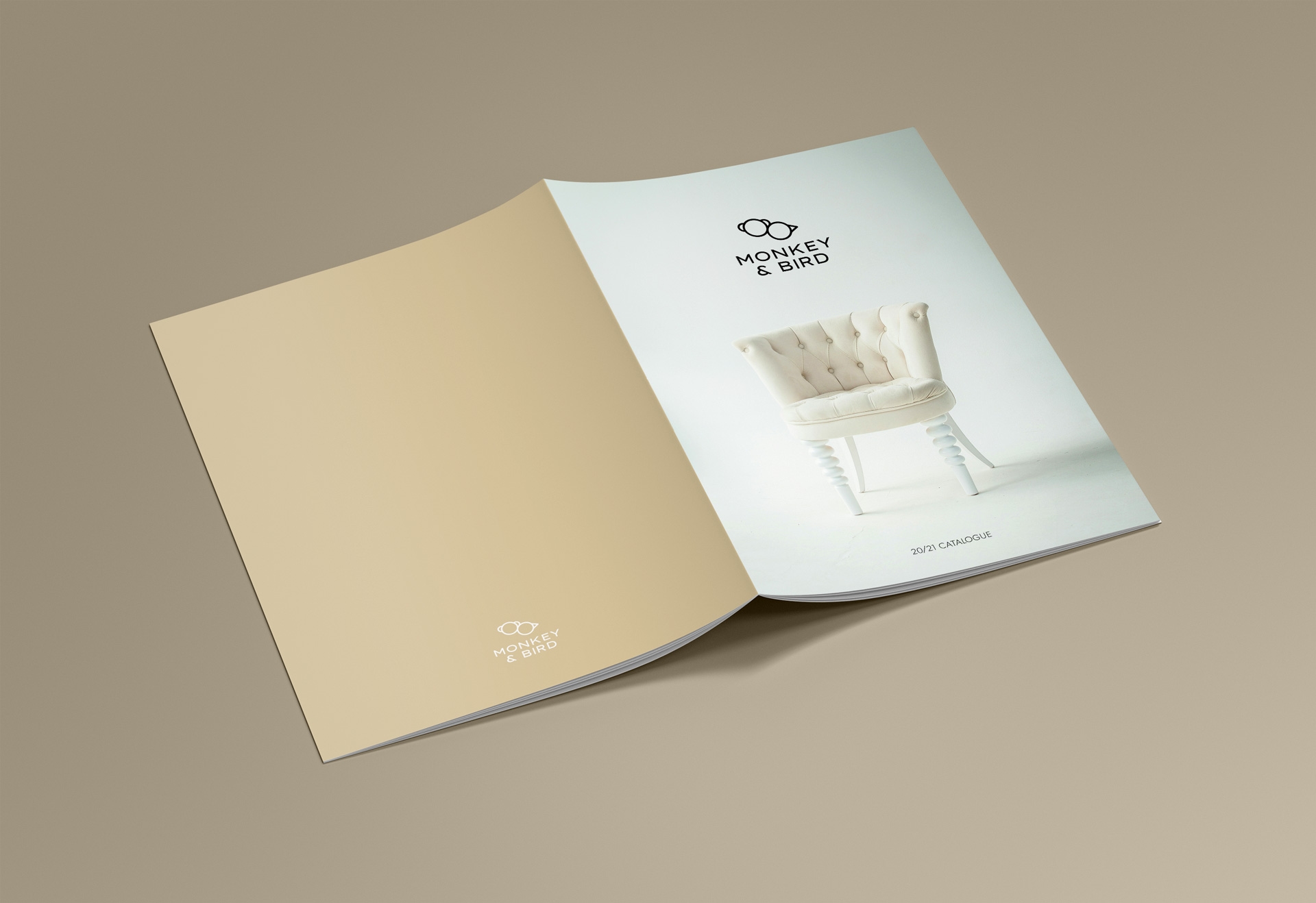 Mockup of a catalogue with the Monkey & Bird logo
